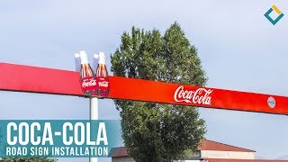 Coca-cola road sign installation