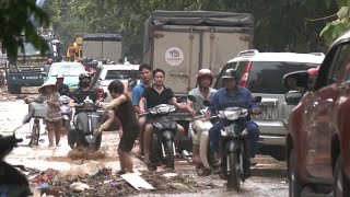 Clean up begins as water recedes in flood-stricken Vietnamese city | REUTERS