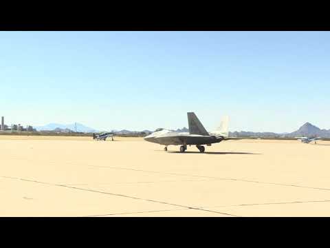 P 51 Mustangs and a F 22 Raptor Fly Together