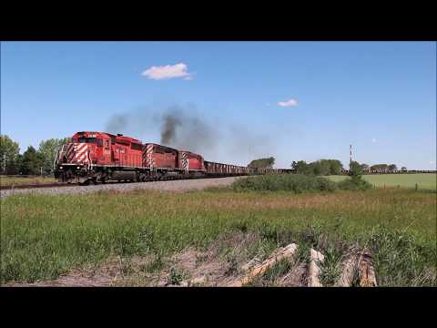 CP 6030 Leads Ballast Train North on the Aldersyde Sub