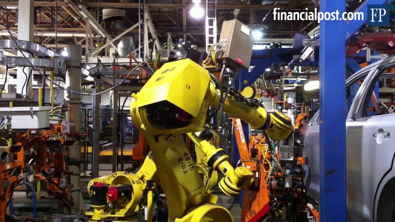 Robots at Ford auto assembly plant.