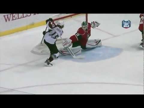 Niklas Backstrom great stretching save in OT vs Avalanche