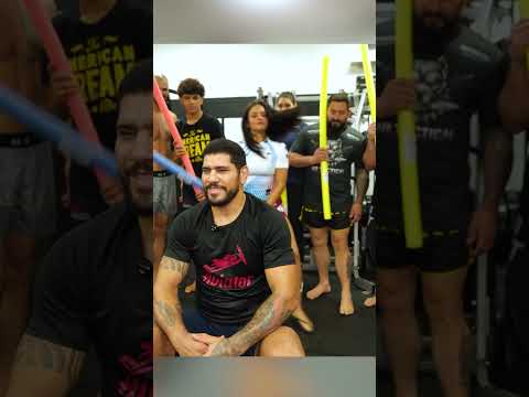 Alex Pereira teaches Nina Drama how to set up a jab and throw the left hook