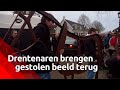 Drentenaren brengen gestolen beeld terug