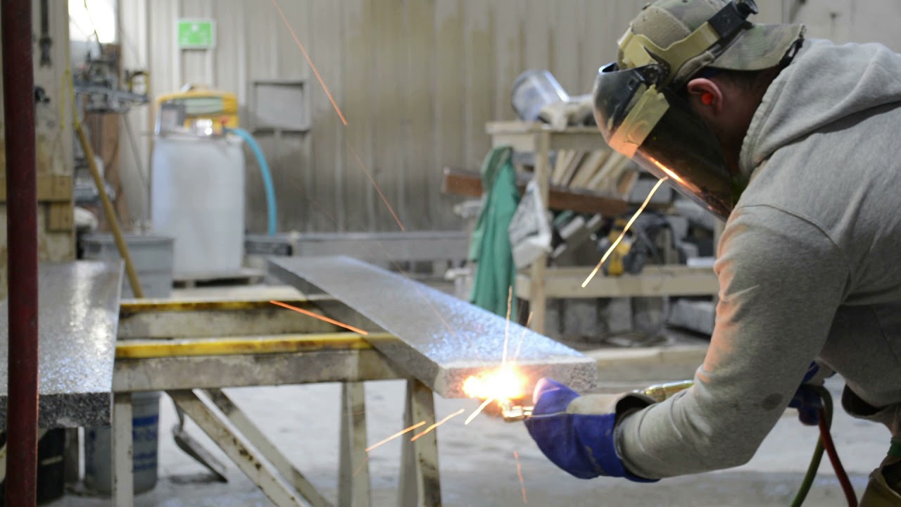 Swenson Granite Works:  Creating an Anti-Slip Finish on a Woodbury Gray Granite Tread