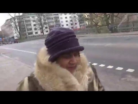 Aruna & Hari Sharma walking on S:t Olofsgatan near Uppsala domkyrka, Apr 25, 2016