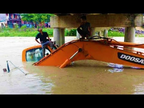 Excavator Sink On The River Heavy Recovery Doosan DX225LCA Komatsu PC200