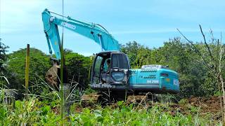 Proses Pengupasan Tanah Memakai Alat Berat