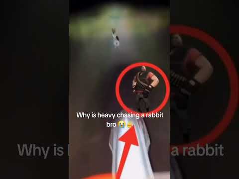 heavy from team fortress 2 chases a rabbit on a mortocycle lmao