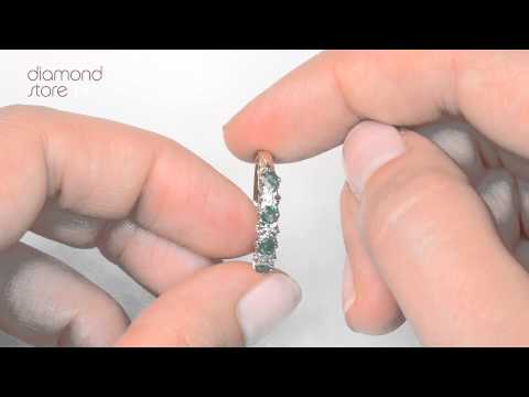 A3334 - Emerald 0.28ct And Diamond 9K Gold Ring