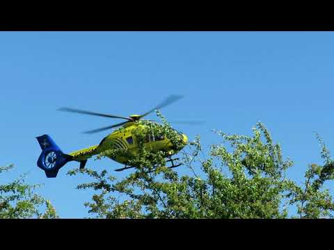 Air Ambulance landing at Sutton reservoir - reason unknown? At 16:54, 12th June 2021.