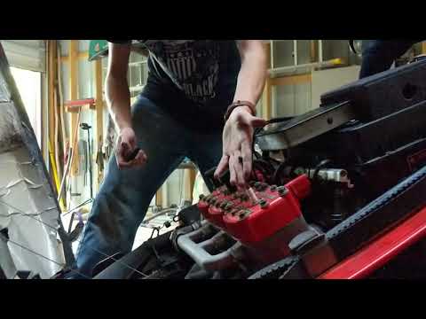 How to replace spark plug caps on Polaris snowmobile