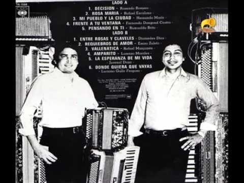 ENTRE ROSAS Y CLAVELES INTERPRETE JULIO MORILLO