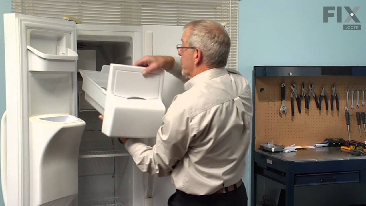 Replacing your Ice Container and Auger Assembly Replacing your Ice Container and Auger Assembly