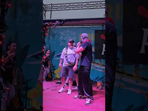 O El Amor at The Boatyard. JULY 2025 Front Row Rich JP the Fireman beats Bongo at his own game.