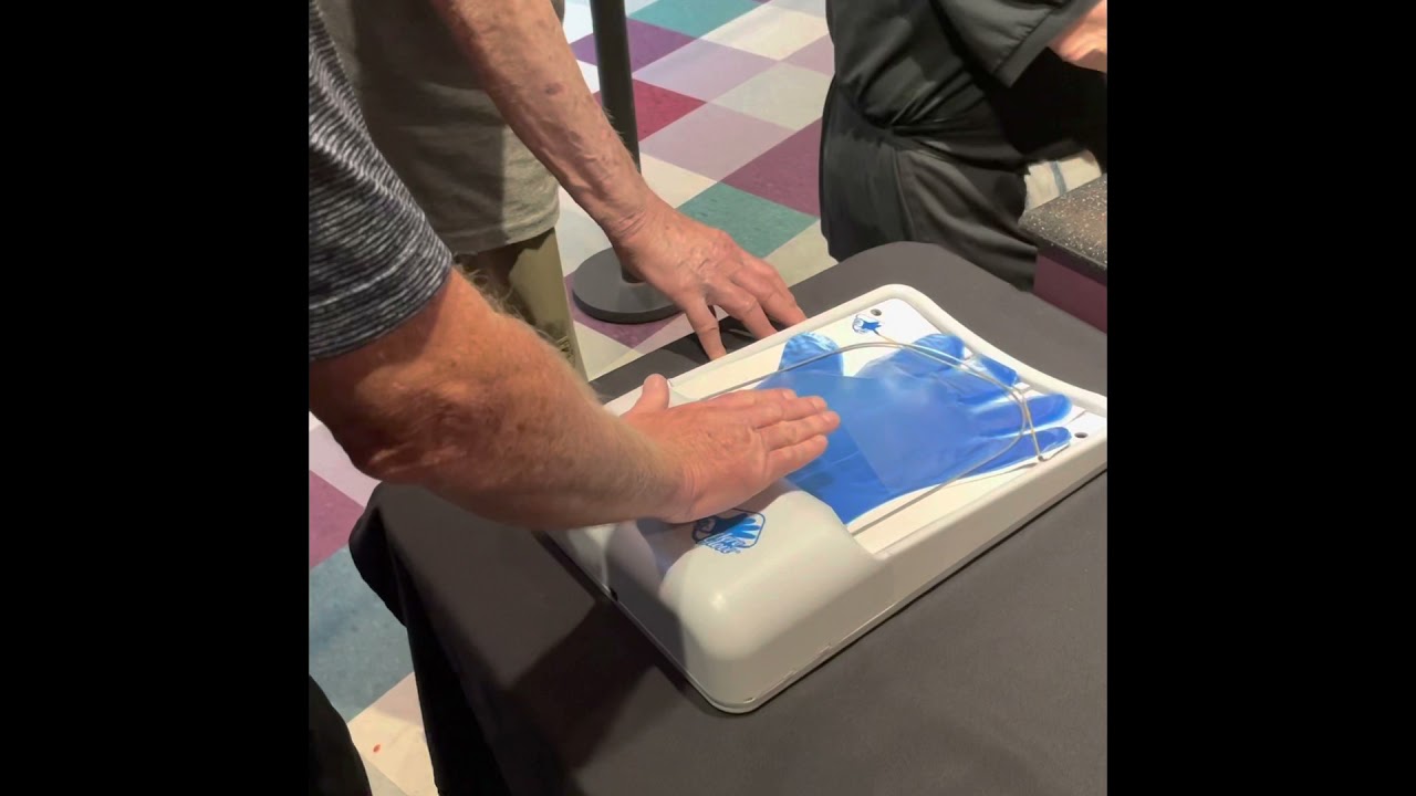 AeroGlove disposable glove dispenser for buffet, motion sensor blows air & expands then insert hand