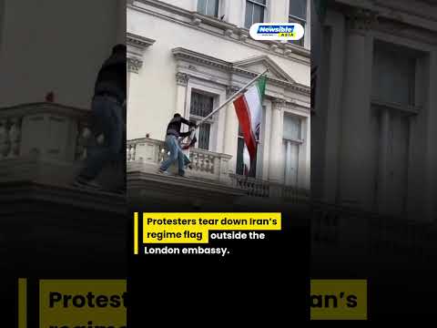 Protester Climbs Iranian Embassy in London, Tears Down Official Flag