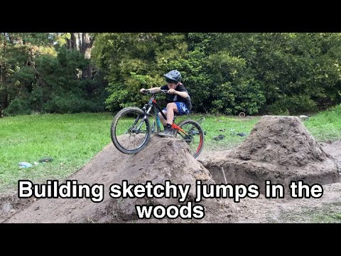 Building SKETCHY Jumps In the woods!!