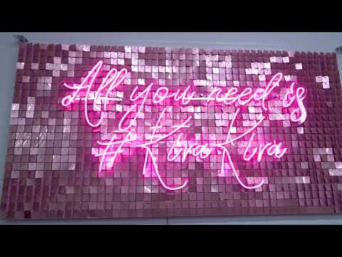 Photo zone with sequins and neon lettering