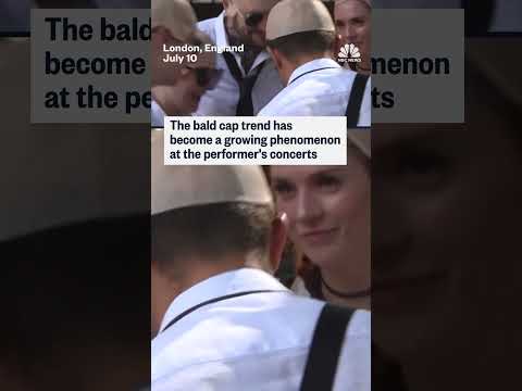 Fans at a Pitbull concert in London set the record for largest gathering of people with bald caps