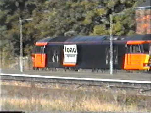 A Class 60 passing through Sleaford with a steel train from Boston docks August 1997