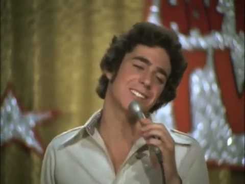 Greg Brady sings 