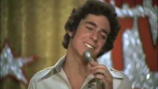 Greg Brady sings 