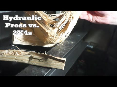 Wooden 2X4s crushed to SPLINTERS by HYDRAULIC PRESS--BONUS coin INSERTED into wood!