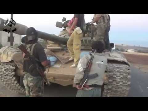 توجه مقاتلي لواء جند الرحمن لبدء معركة السيطرة على بلدة تل ملح في ريف حماة