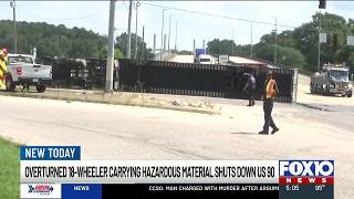Overturned 18-wheeler carrying hazardous material shuts down US 90 in Mobile, officials say