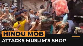 Download lagu Video shows Hindu mob attacking Muslim-owned shop in India | AJ #Shorts mp3