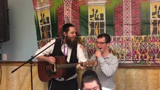 Joey Newcomb plays at harmony services pre purim party