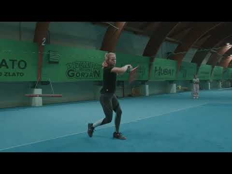 WTA Pro Veronika Erjavec practices with Sportbot tennis ball machine