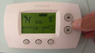 How to override the programing on Honeywell Thermostat
