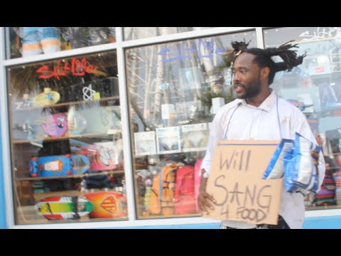 Homeless man sings John Legend's "All Of Me"