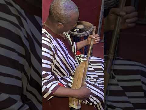 my Father Yacouba Dembele. a master Griot Ngoni player. playing a traditional tune Bakaridjan