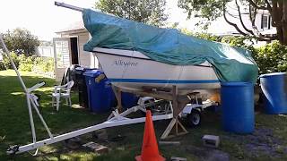 Removing boat from trailer on land part 1.