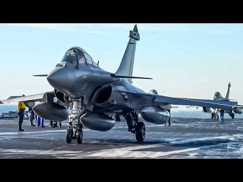 Powerful French Dassault Rafale Fighter Jet Launching from a Massive Aircraft Carrier At Sea