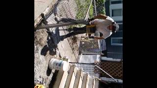 Jack hammering an old concrete walkway (No Man Services)