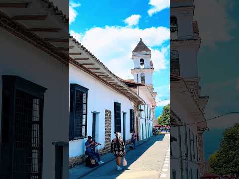 Violin 🎻 notes echoing through the colonial streets of Santa Fe de Antioquia! #colombia #santafe