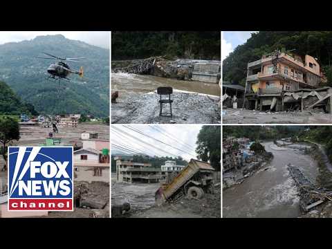 RISING DANGER: New flood danger looms as rescue crews look for survivors in Nepal disaster