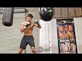 RYAN GARCIA DRILLING POWER PUNCHES ON THE AQUA BAG PERFECTING TECHNIQUE