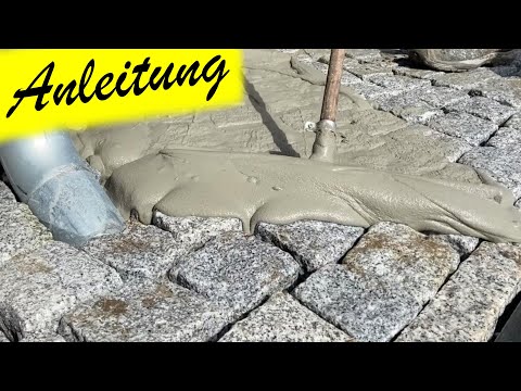 Grouting of paved stone surface with paving joint mortar