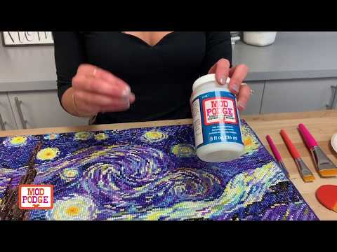 Part of a video titled Sealing your Diamond Dot Art with Mod Podge - YouTube