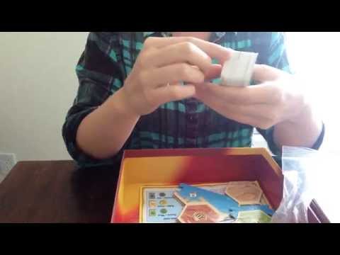 ASMR unboxing board game. tapping, scratching, crinkles, dice