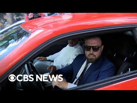 Watch: Lawyer hits car while trying to escape reporters outside courthouse