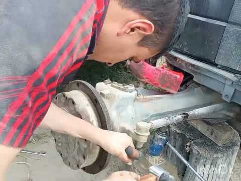 COMO CAMBIAR UN RETENEDOR DE LA RUEDA DELANTERA #TRACTOR NEW HOLLAND