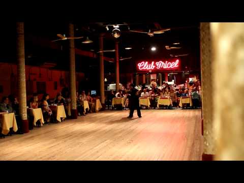  Pablo Martin Giorgini  and  Noelia Coletti  are  dancing  to  the  tango  "  Torrente  "