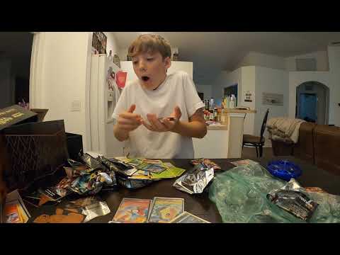 Kid pulling a Charizard vmax out of a Shining Fates ETB