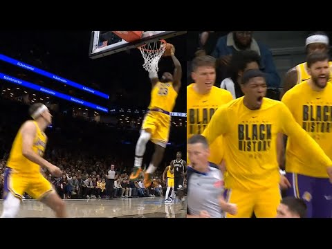 Austin Reaves lobs it off glass to LeBron for dunk then LeBron has Lakers hyped